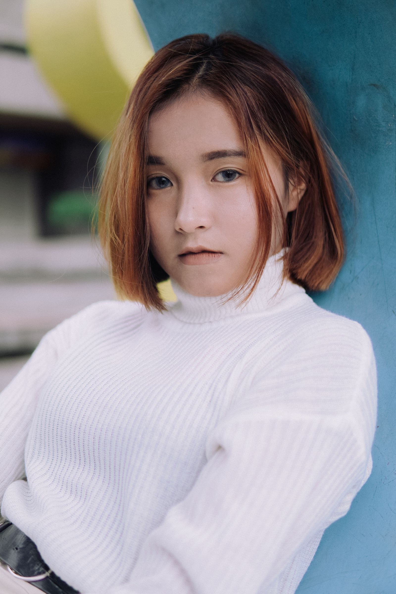 15 Elegant Italian Bob Haircut Ideas for a Sophisticated Look Portrait of a young woman with a short bob haircut in a casual pose