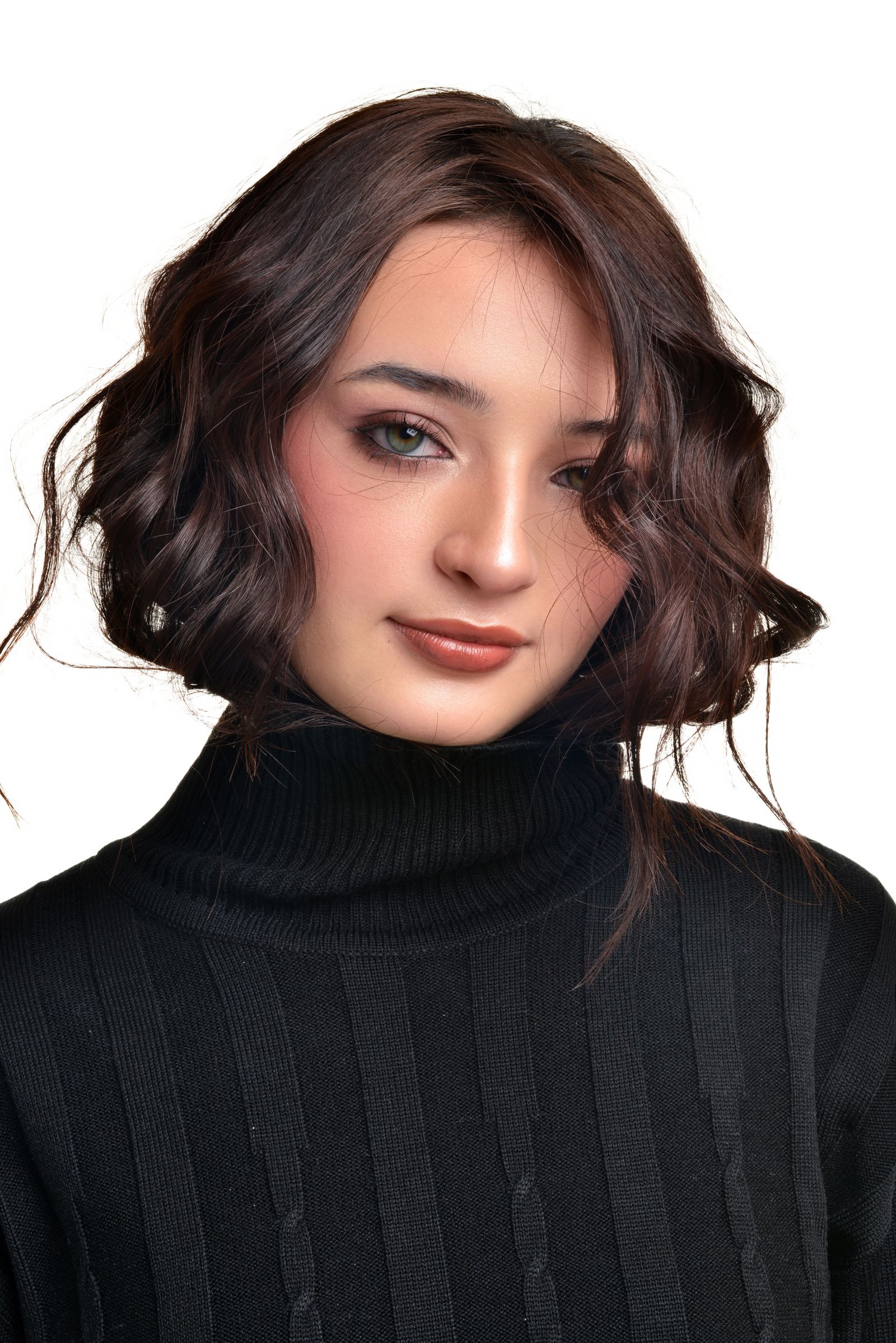 15 Elegant Italian Bob Haircut Ideas for a Sophisticated Look Portrait of a woman with a curly bob-length haircut wearing a black turtleneck