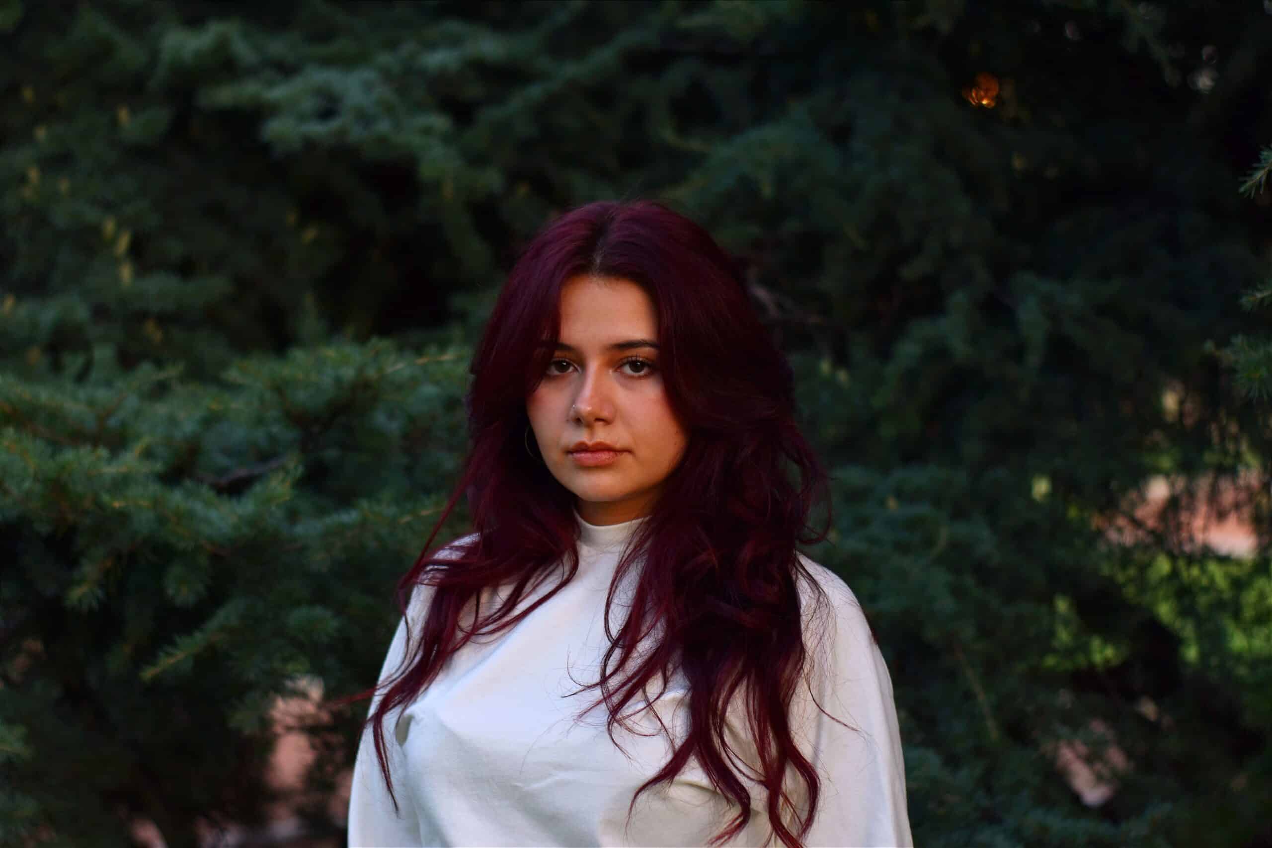 15 Fall Hair Color Ideas for 2026 (Espresso, Copper & More) Cherry cola fall hair color 2026, deep brunette with burgundy tones