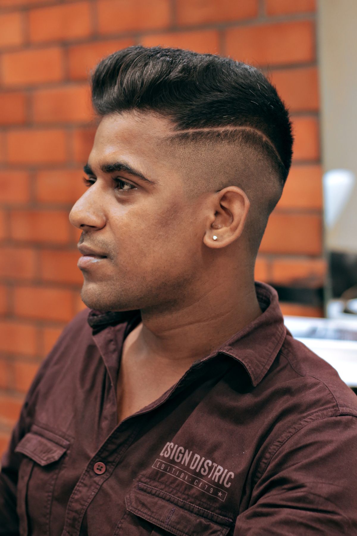 18 Best Short Haircuts for Men with Thick Hair (2026 Guide) Mid fade with quiff haircut for thick hair men