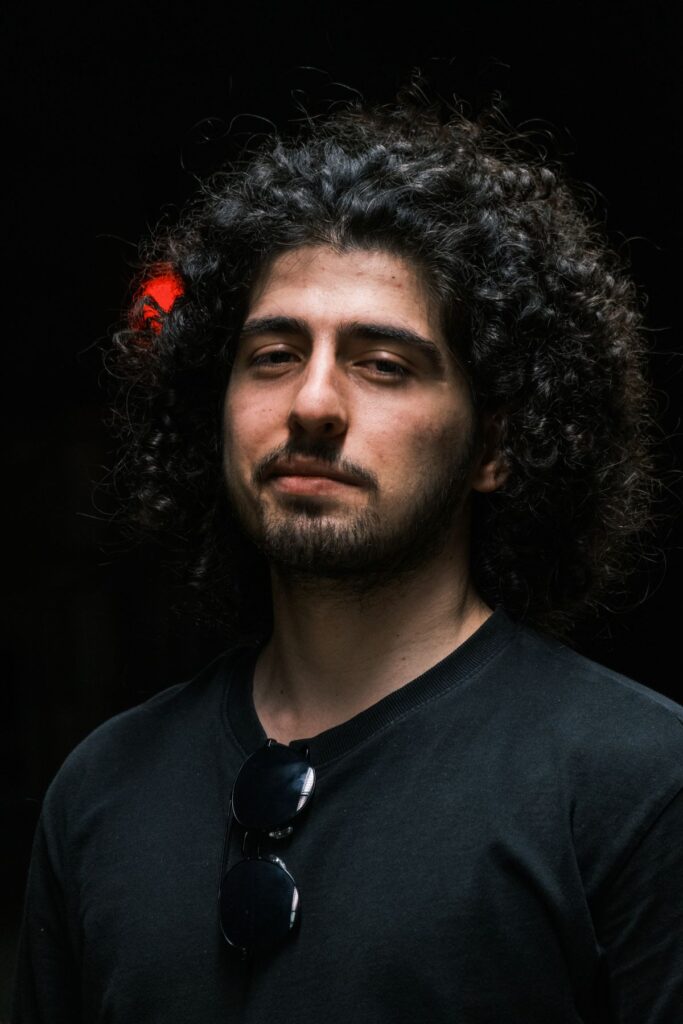 15 Latest Men's Hairstyles Trending in 2026 Long curly hairstyle for men — latest trends 2026