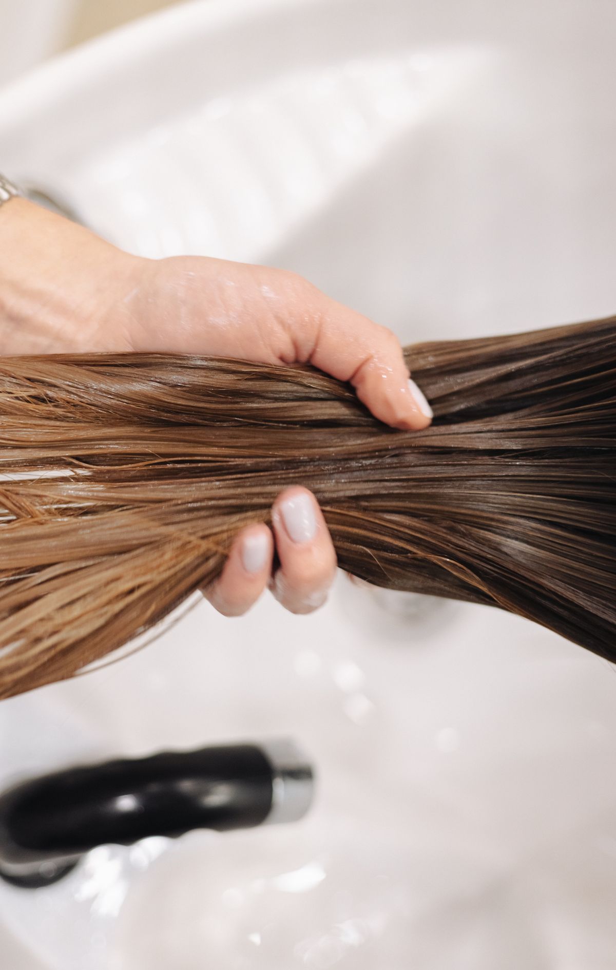 12 Essential Hair Care Tips for Healthy, Gorgeous Hair (2026 Guide) Conditioning wet hair — essential hair care tips