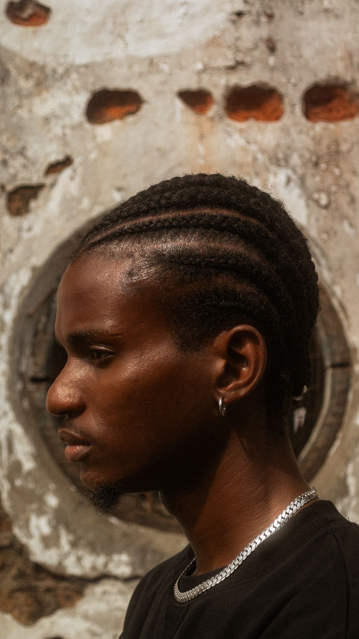 15 Sharp Haircuts for Black Men (2026 Guide) Protective braided hairstyle for black men