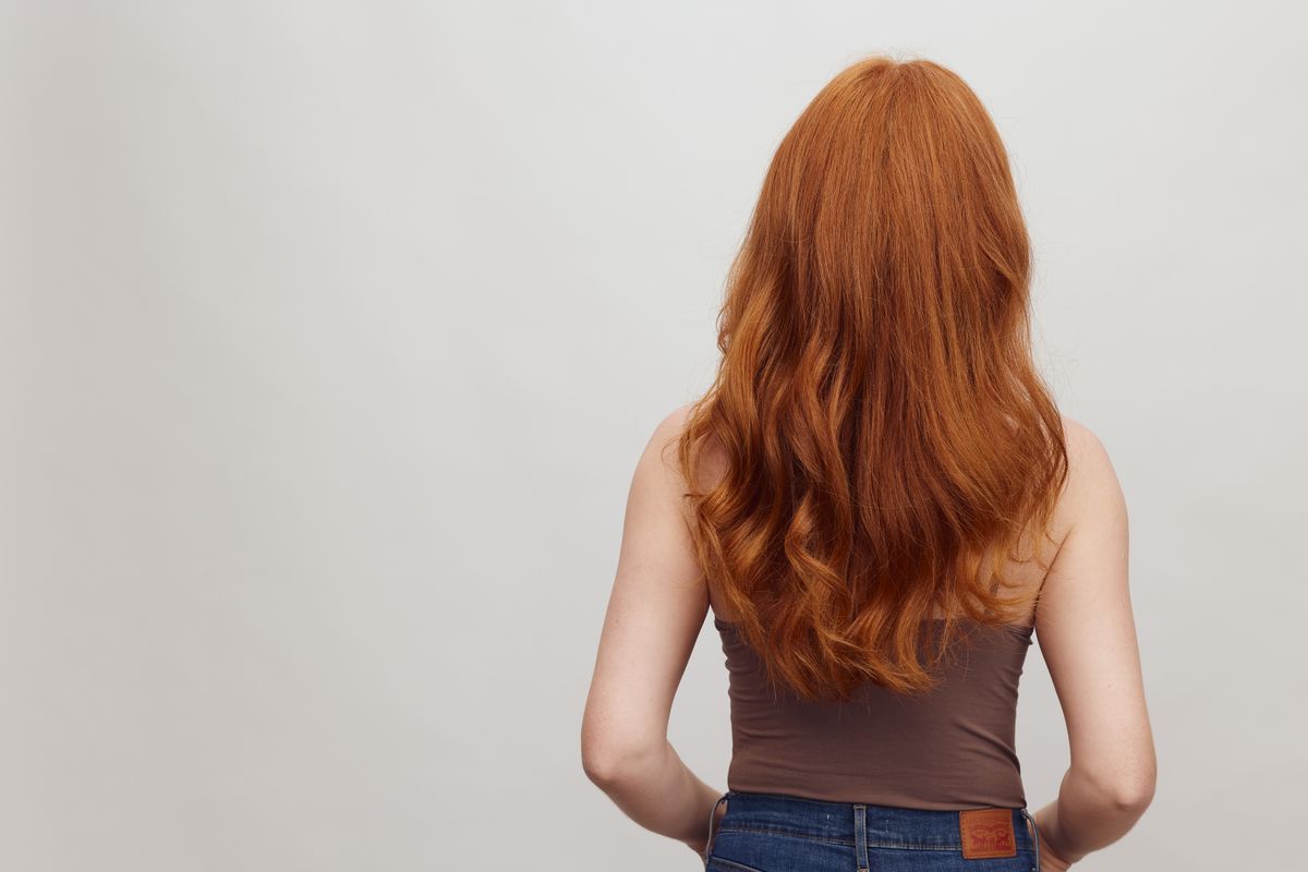 18 Gorgeous Long Hairstyles for Women (2026 Guide) Long layered hairstyle for women — long hair back view