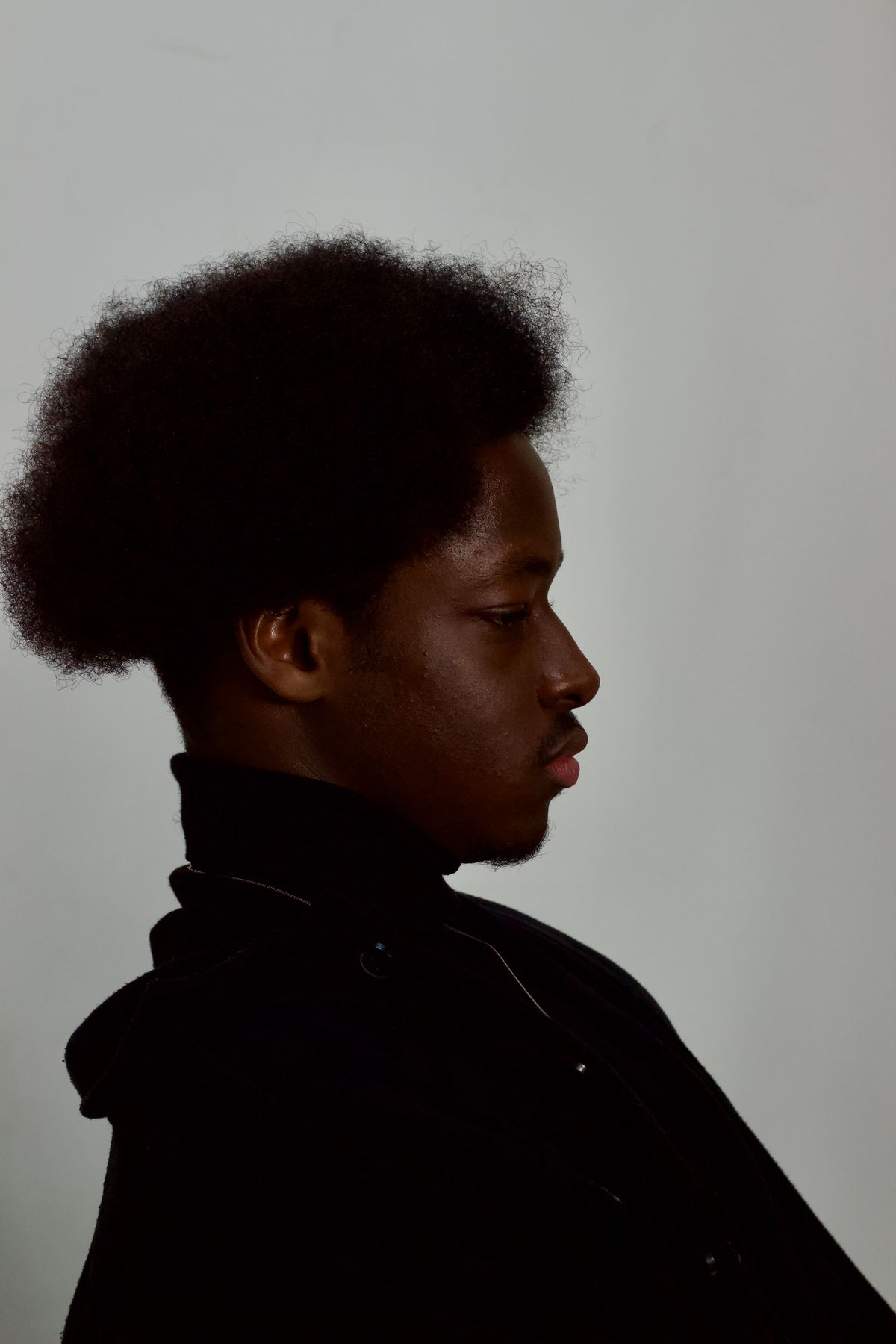 15 Sharp Haircuts for Black Men (2026 Guide) Tapered afro haircut for black men
