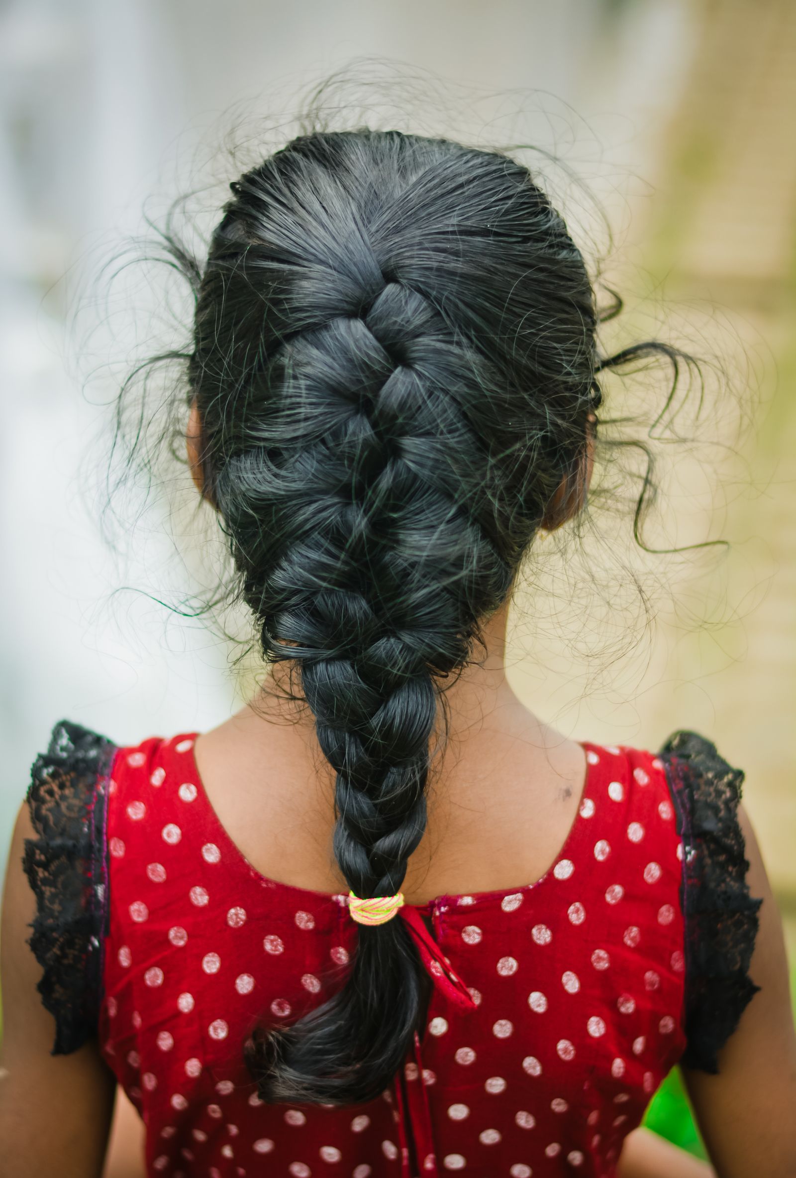 20 Adorable Halloween Hairstyles for Kids to Try Morticia sleek french braid — halloween hairstyle for kids