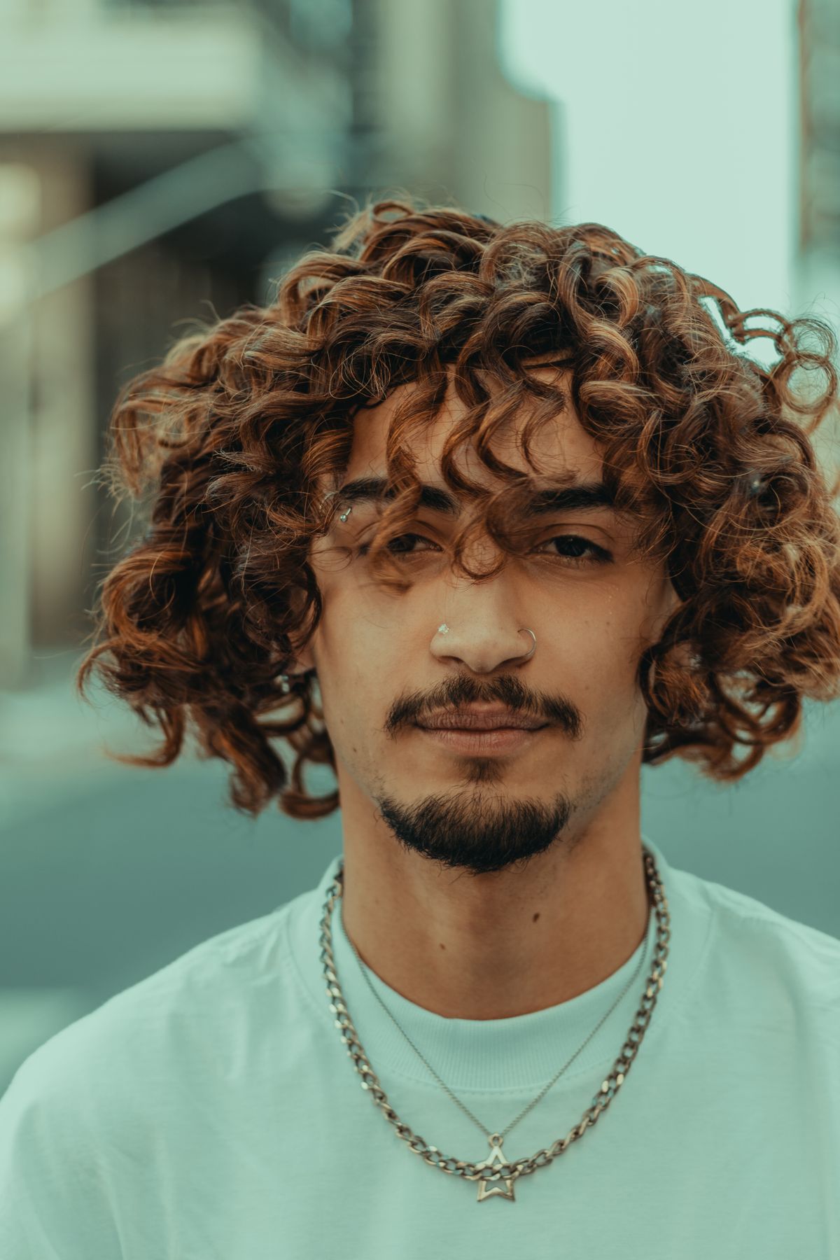 18 Best Short Haircuts for Men with Thick Hair (2026 Guide) Drop fade with curly top haircut for men with thick curly hair