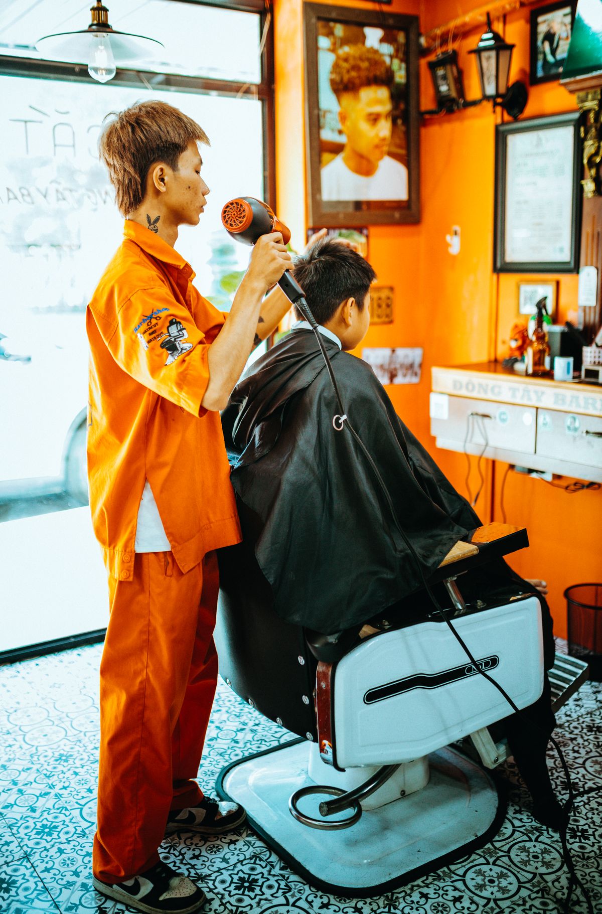 16 Trendy Asian Men Hairstyles (2026 Guide) Asian barber cutting hair — find a barber experienced with asian hair