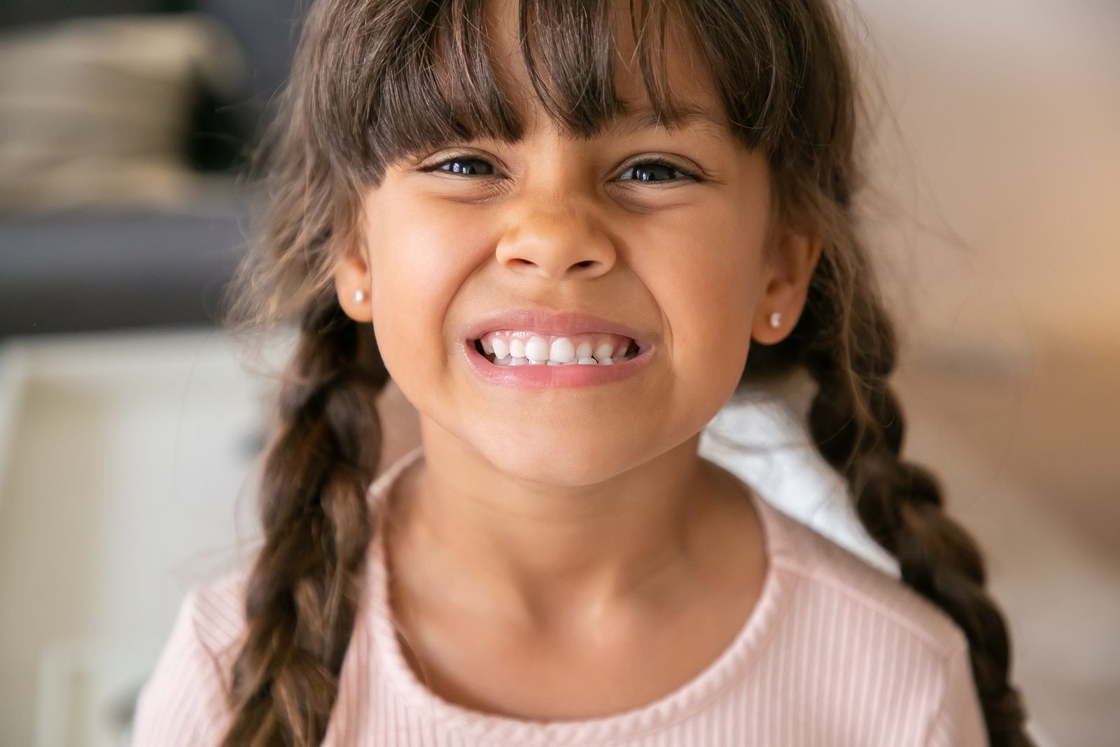 20 Adorable Halloween Hairstyles for Kids to Try Black cat braided pigtails — halloween hairstyle for kids