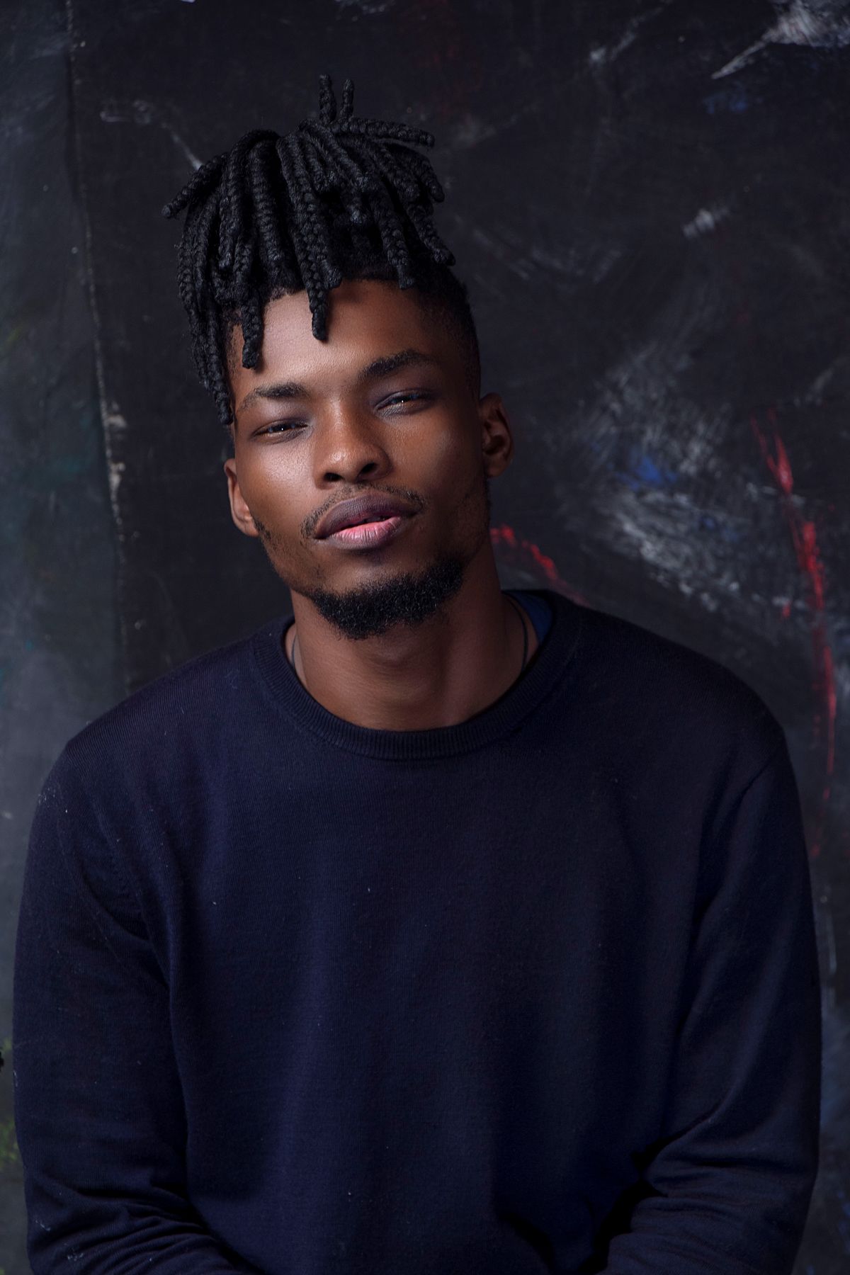 15 Sharp Haircuts for Black Men (2026 Guide) Sharp haircuts for black men — modern twisted loc style