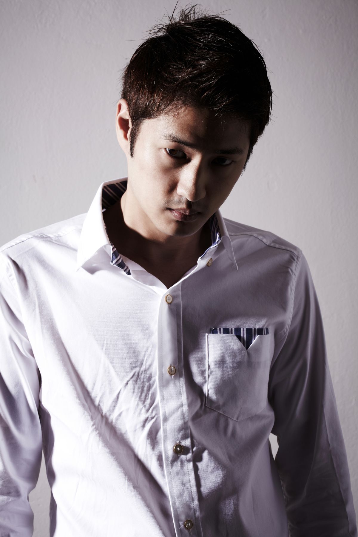 16 Trendy Asian Men Hairstyles (2026 Guide) Textured crop haircut for asian men