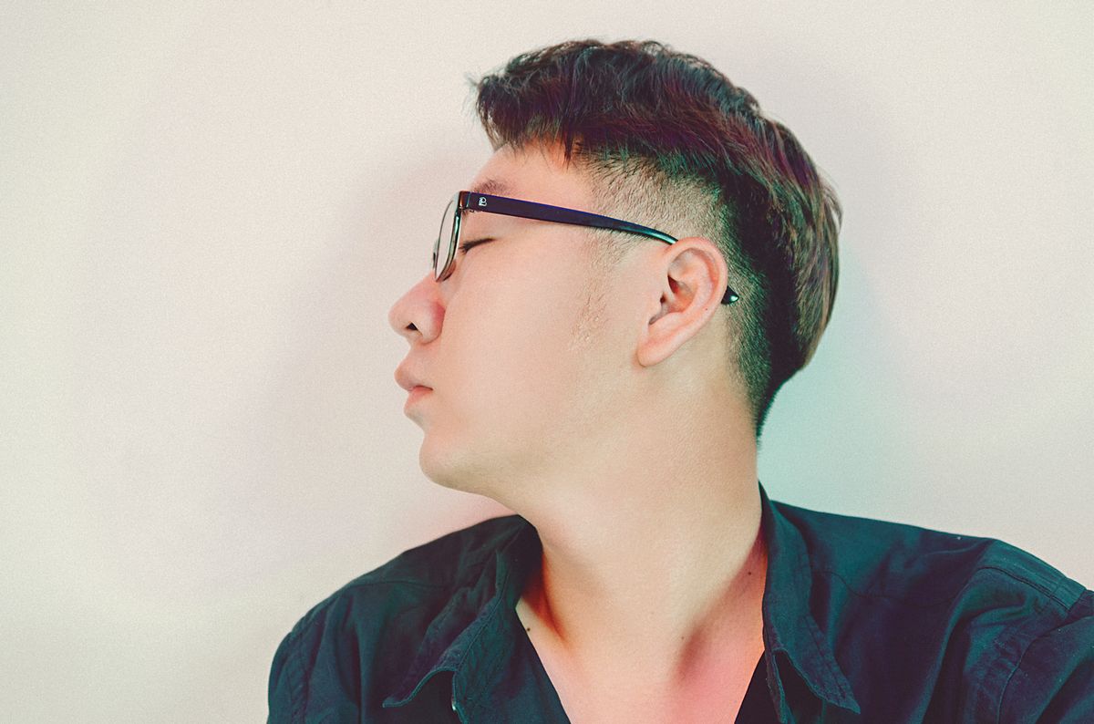 16 Trendy Asian Men Hairstyles (2026 Guide) Side part taper haircut for asian men